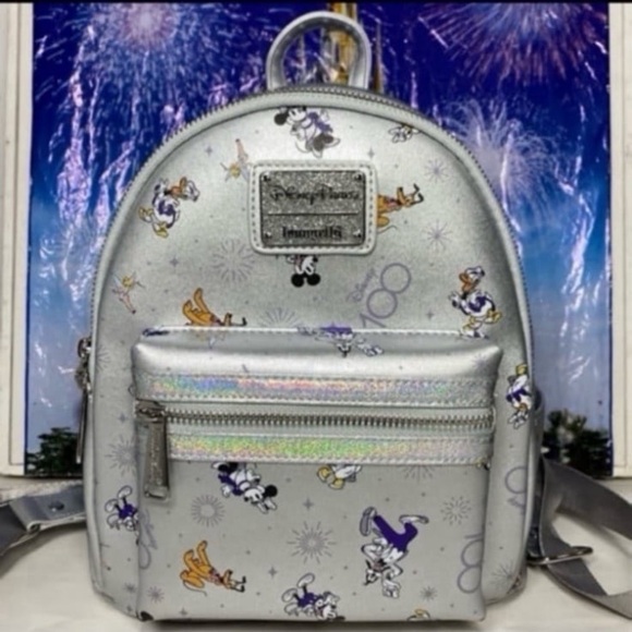 Loungefly Handbags - Disney parks 100th anniversary Mickey and friends AOP Loungefly mini backpack
